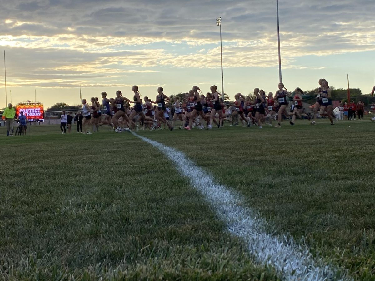 Runners at the MCHS Riverhawk Invitational take off on September 24th. 