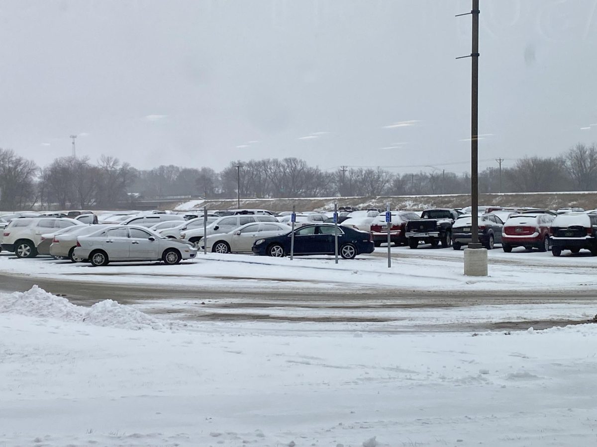 Members of Boys' Swim Team Spread Some Christmas Cheer After Tuesday's Ice Storm