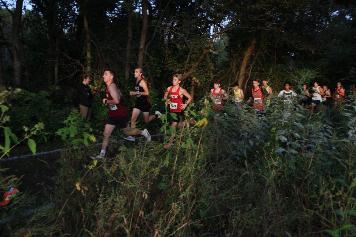 Sophomores Keigan Flaherty and Kyran Hirsch compete for space in a tight pack. 