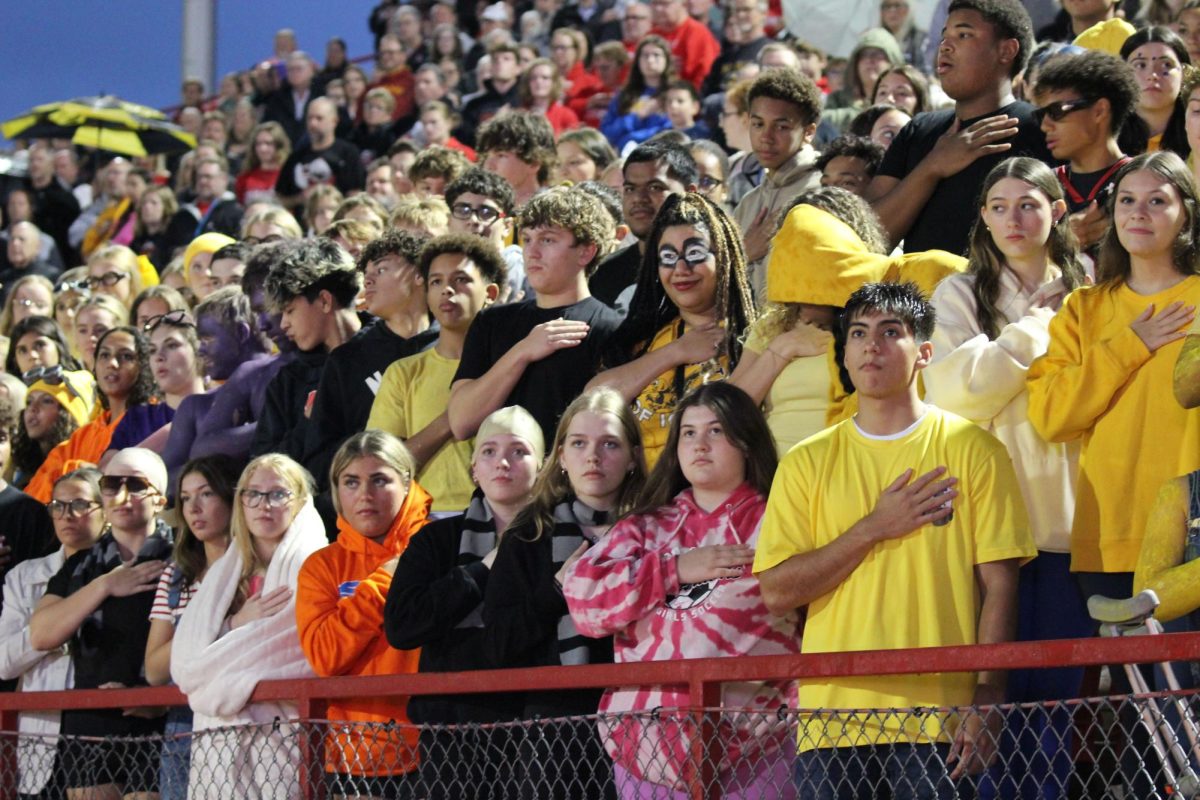 MCHS student body during national anthem - minions theme 