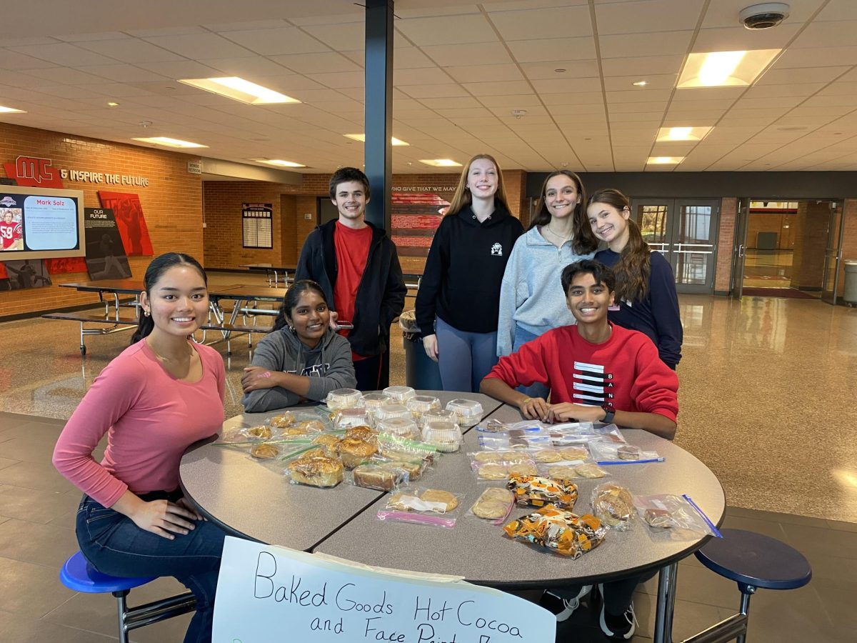 Key Club members Alexandria Paulino ('26), Kaitlyn Thangaraj ('26), Hektor Kershner ('29), Anya Frenchick ('28), Sara Schutt ('28), Mauli Patel ('28), and Danika Van Syoc ('28) were selling baked goods in the atrium Thursday night to raise money for an education program in Zambia.