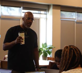 Che Whitner talking to students in the 'School Within a School' at MCHS.
