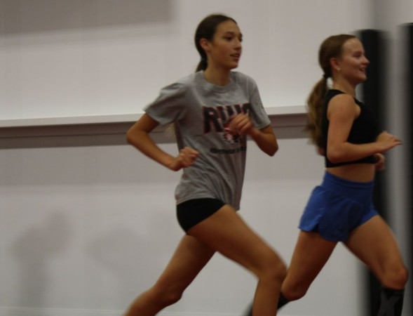 Penelope Scott shows dedication at cross country practice in the Mason City Fieldhouse. Sept. 24
