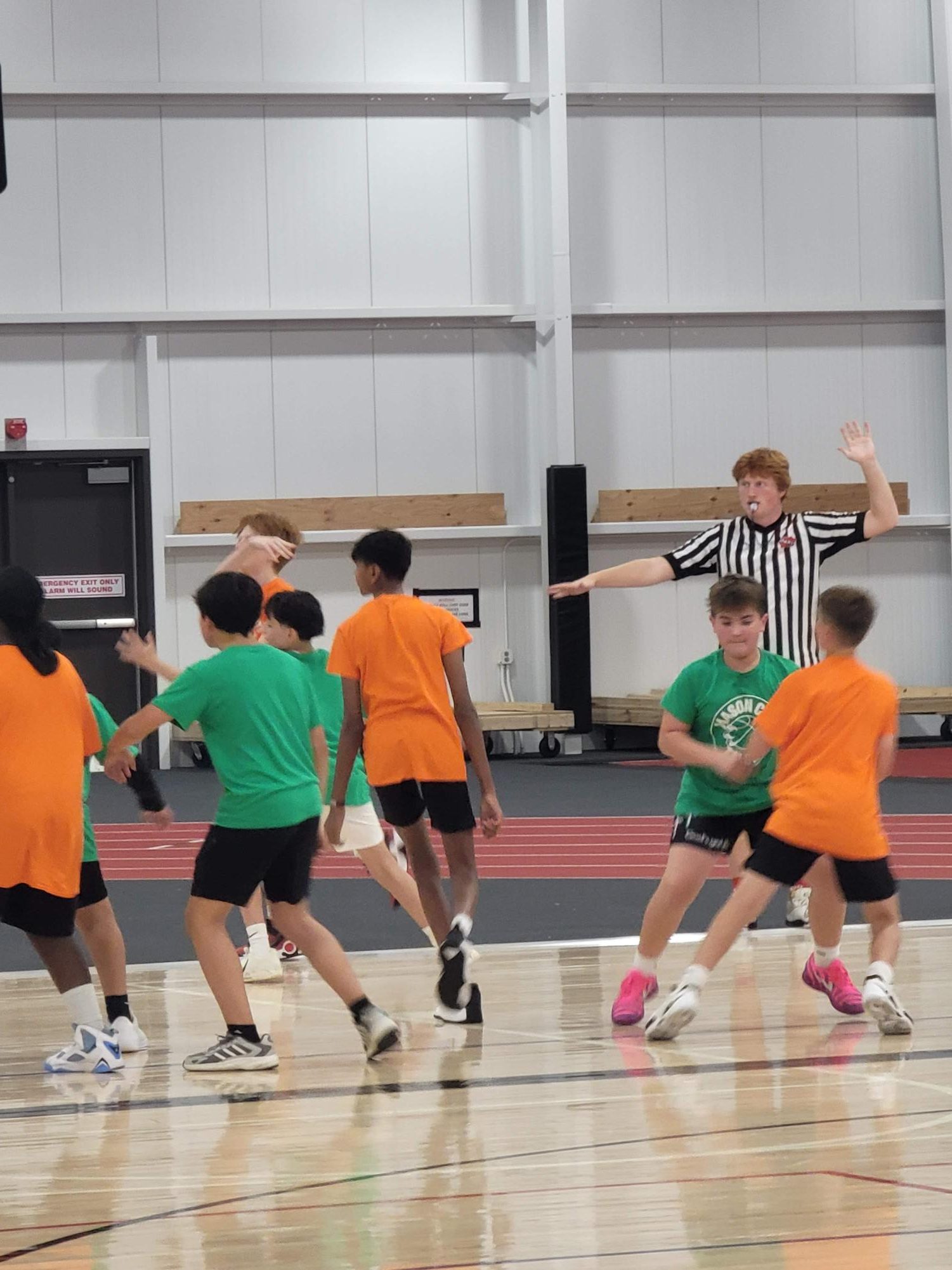 MCHS Junior Jack Boedeker referees seventh and 8th grade players at the Talons Skills Clinic. This is Boedeker's third season officiating games. "I can work six days a week if I want to," says Boedeker about the demand for referree jobs.