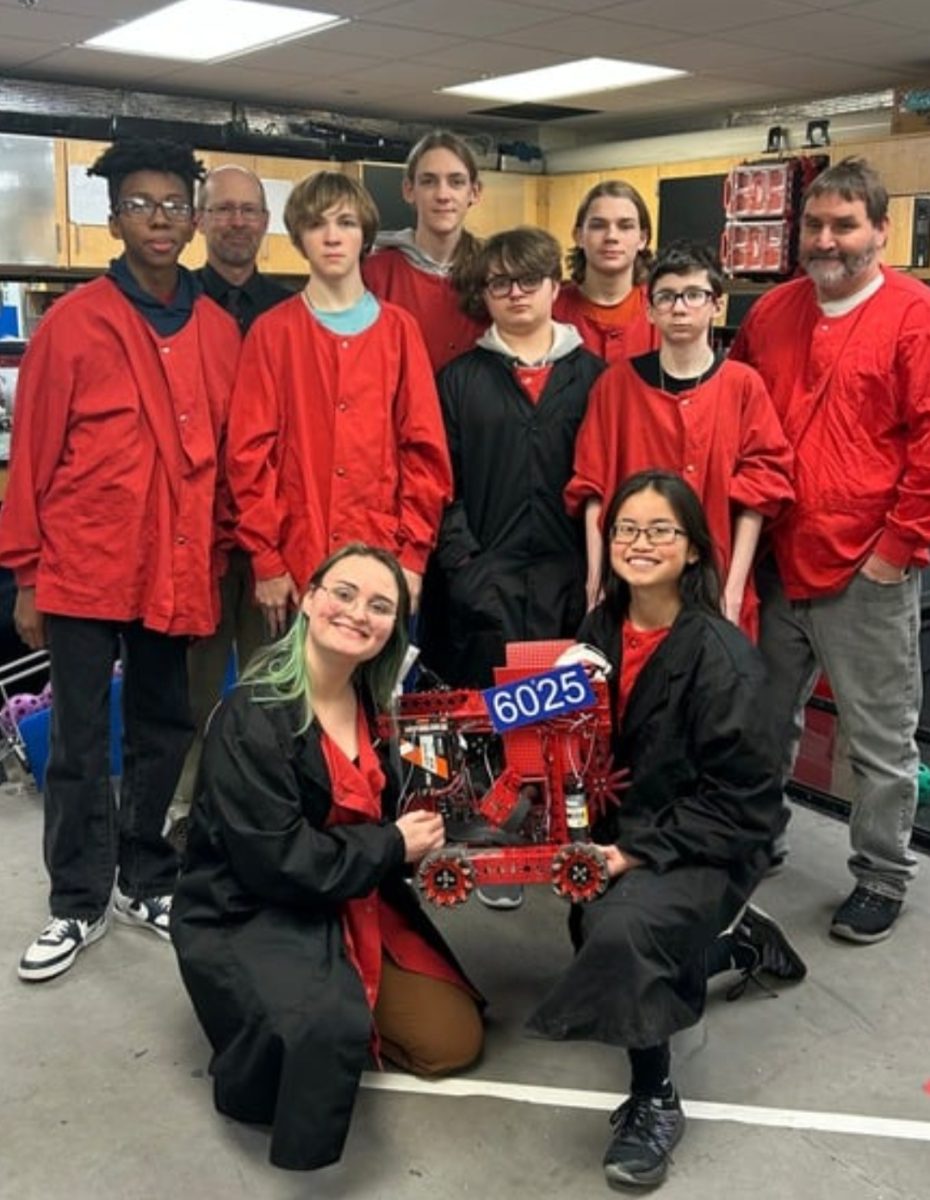 Front row: Julia Hines, London Philpott. Second row: Jayden Nelson, Logan Peterson, Charles Hines, Gabe Schaer, Coach Jeff Hines. Back row: Coach Bill Riesen, Colin Peterson, Daniel Edwards