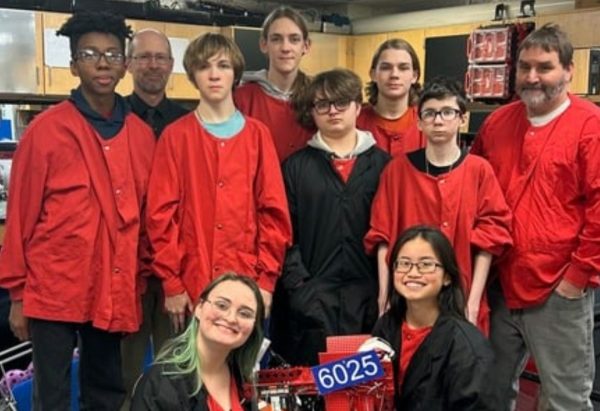 Front row: Julia Hines, London Philpott. Second row: Jayden Nelson, Logan Peterson, Charles Hines, Gabe Schaer, Coach Jeff Hines. Back row: Coach Bill Riesen, Colin Peterson, Daniel Edwards