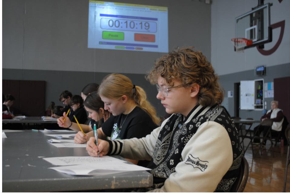Keagan Tyler ('28) takes the 50 question literature exam with 10 minutes remaining on the clock. 