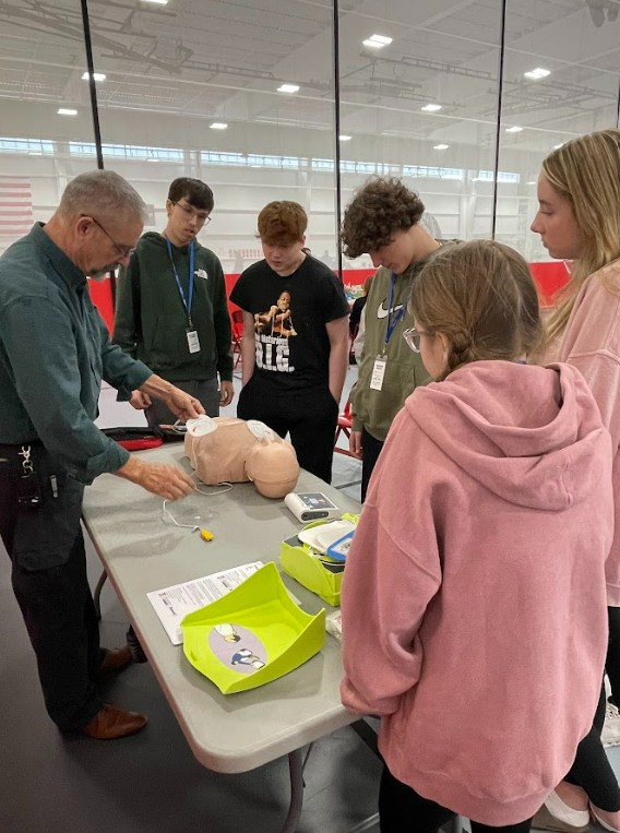 Students learn some hands-on paramedic skills at the l2025 Career Day at MCHS. 