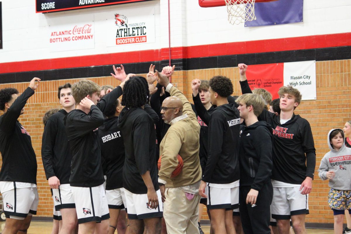 Varsity Boys Basketball courtside on Senior Night Tuesday, Feb. 3, against Waterloo East. Riverhawks won 72-50.