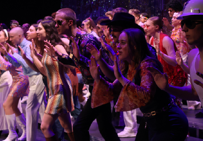Concert choir rehearses their medley, Chicago in Concert, at a dress rehearsal Monday night. 