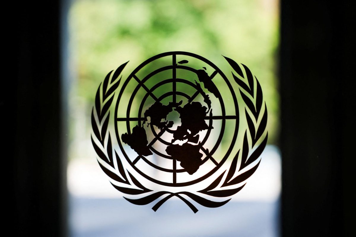 The United Nations logo adorns a window at U.N. headquarters in New York City, U.S., September 18, 2025. It is the organization through which Model UN students simulate the process of debating global issues and developing policy. REUTERS/Jeenah Moon