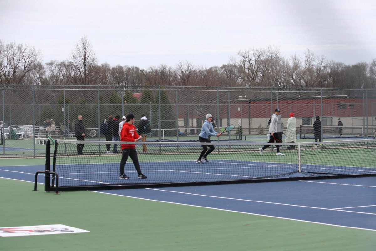 Seniors, Avery Beyer and Leif Lundberg playing in a doubles match against the Fort Dodge Dodgers where they won 6-1 in the first set and 6-2 in the second set.